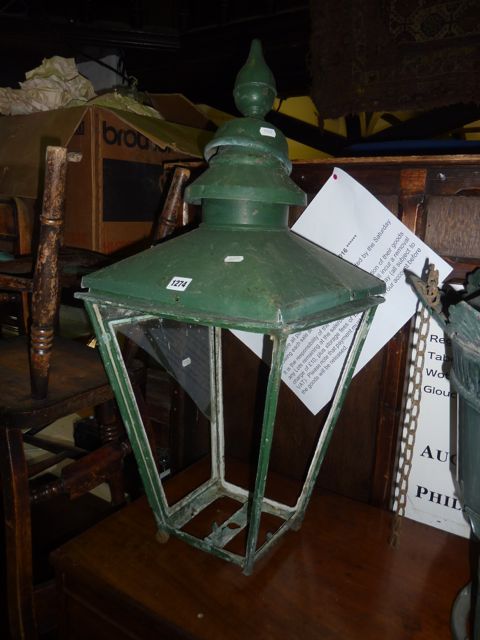 A Victorian street lantern hood of square tapered form with raised finial and green painted