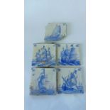 A collection of early 19th century Delft type tin glazed earthenware tiles with blue and white