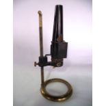 A 19th century microscope lamp fitted with a red filter by W Watson & Sons Limited, London, the