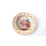 A 19th century dessert plate with good quality painted decoration of a flower basket with flowers