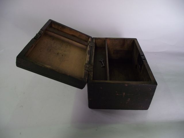 A rustic 19th century pine box of rectangular form, the hinged lid bearing a looping brass handle - Image 2 of 2