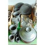 A quantity of antique pewter wares to include two plate warmers marked Compton, London, large