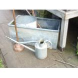 A galvanised trough of rectangular form, further galvanised ware to include watering can, bin,