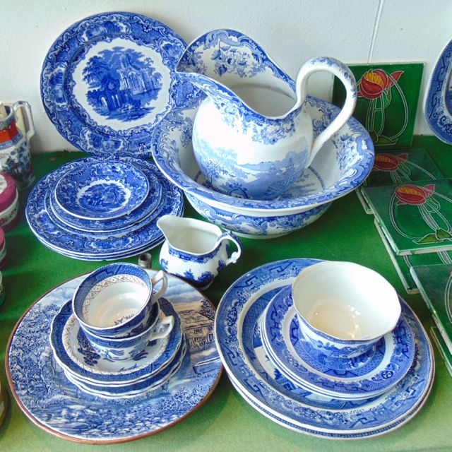 A collection of 19th century and other blue and white printed wares including a jug and basin set