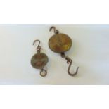 Two antique Salter spring balances, one with a diameter of 26 cm approx, the other 15 cm approx,