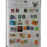 5 stamp albums containing a miscellaneous worldwide collection of stamps, mainly mid-20th century