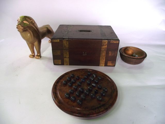 A 19th century rosewood veneered case with brass banded detail and flush fitting campaign type