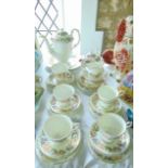 A collection of Royal Albert and Paragon Country Lane pattern tea and coffee wares comprising coffee