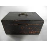 A rustic 19th century pine box of rectangular form, the hinged lid bearing a looping brass handle