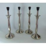 A set of four matching contemporary nickel plated table lamps
