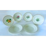 A set of four 19th century Berlin dessert plates, one painted with pears, the other three with