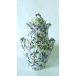 A large 19th century two handled vase and cover with printed and infilled floral and catkin