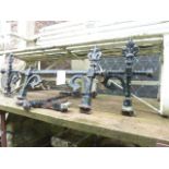 A Victorian wrought iron three sectional balcony/window box rail with fleur-de-lys finials