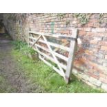 A reclaimed weathered soft wood five bar gate 10ft wide approximately