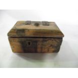 A small rustic timber box of rectangular form, believed to be Indian in origin, with heavy iron