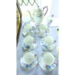 A collection of Crown Staffordshire coffee wares in the Art Deco manner with transfer printed and