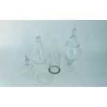 Clear glass ware to include a cylindrical dome (possibly medical/scientific), a finial lidded