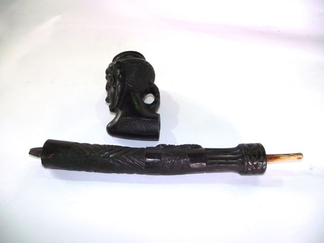 A substantial African carved hardwood pipe, the bowl in the form of a facial study with further - Image 2 of 3