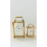 A contemporary carriage clock in a brass case with 8 day timepiece, marked Dominion together with