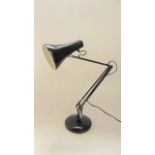 A vintage angle poise desk lamp, the adjusting framework over one large and two small springs,