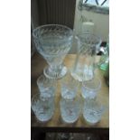 A set of six good quality clear cut glass tumblers together with a clear glass jug with cut