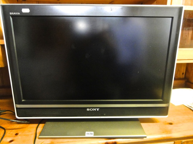 A Sony Bravia 26 inch flat screen television, model number KDL-26T3000 complete with remote control