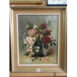 A 20th century oil painting on canvas, still life with red and pink roses in a blue and gilt vase,