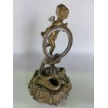 A good quality 19th century bronze watch holder, modelled as a cobra with inset red glass eyes,