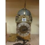 An old English style lantern clock, the case of typical form with a 30 hour weight driven movement