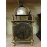 An old English style lantern clock of usual form, the case of traditional form and with 8 day spring