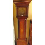 A late 18th century oak longcase clock, the full length door crossbanded in walnut and with an