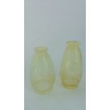 Two similar Victorian Vaseline glass shades of tapering cylindrical form, each with moulded