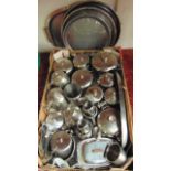 A box containing a quantity of contemporary stainless steel kitchenalia to include trays, teapots,