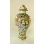 A 19th century Cantonese vase and cover with globular upper section, with polychrome painted