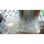 A large quantity of clear glass to include numerous beakers, drinking glasses including wines, etc