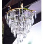 A good quality five tier ceiling hanging drop chandelier with cut glass droplets and ormolu type