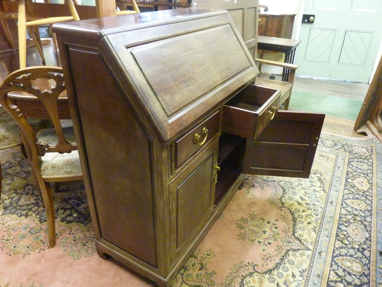 A Chinese rosewood writing bureau, the fall flap enclosing a simply fitted interior over two drawers - Image 3 of 3