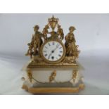 A mid 19th century alabaster and gilded spelter mantle clock, the movement between two figures in