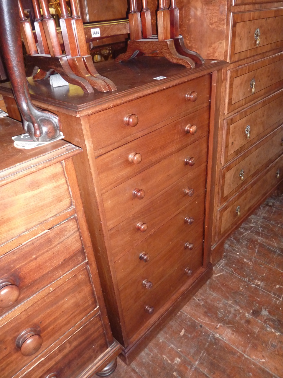 A 19th century mahogany Wellington chest of seven drawers with central locking bar, 62cm wide