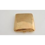 A 9ct gold cigarette case, Charles S. Green & Co. Ltd, Birmingham, of plain rounded rectangular