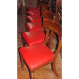 A set of six William IV mahogany spade back dining chairs with carved detail, fluted supports and