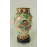 A 19th century Japanese Kyoto type vase of shouldered form with relief moulded and polychrome