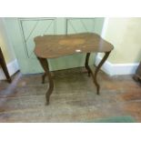 A 19th century mahogany occasional table the rectangular top of waisted form with extensive