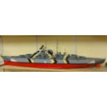 A large remote control scale model of the "Bismarck" approximately 6ft long, together with a bespoke