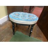 A Victorian centre stool, the oval top with well worked German beadwork detail, principally in