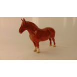 A Beswick model of a chestnut coloured Suffolk Punch horse with circular printed mark to base and