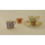 A miniature Royal Worcester blush ivory tyg with painted floral sprays and with puce printed mark to