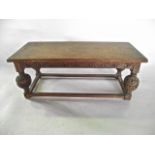 A good quality oak model in the form of a continental Jacobean period refectory table with carved