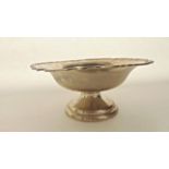 A George V silver pedestal dish, Walker & Hall, Sheffield, 1925, the plain circular bowl on a