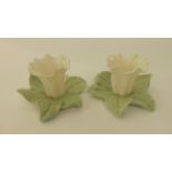 A pair of 19th century Grainger Worcester posy holders in the form of daffodil heads with pale green